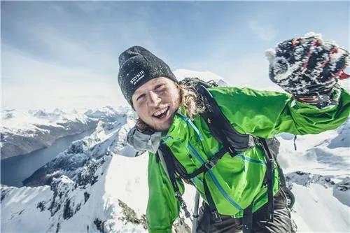Man wearing Brynje undergarments standing on a mountain top.